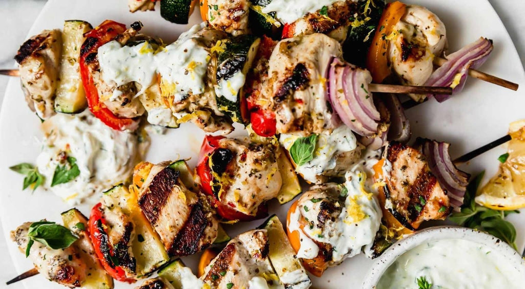 Greek Style Chicken Slouvaki with Lemon, and Garlic Olive Oil Garlic Roasted Potatoes